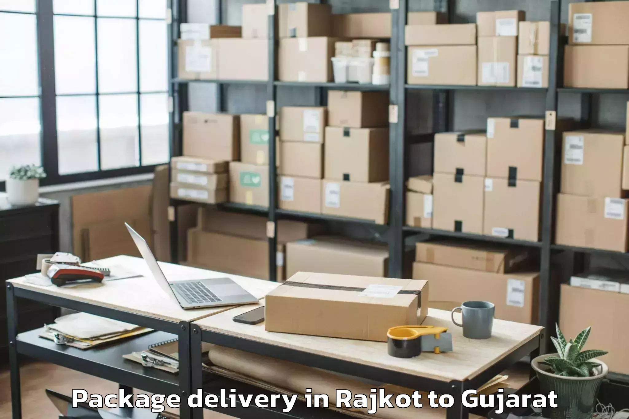 Reliable Rajkot to Anand Agricultural University Package Delivery